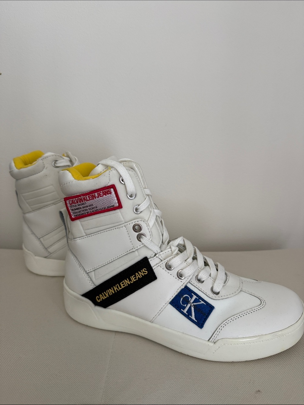 Calvin Klein Jeans White High-Top Sneakers with Blue & Yellow Accents
